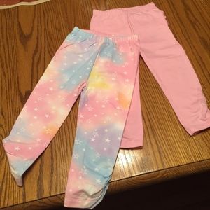 Two pairs of pants from Baby Place -12-18m